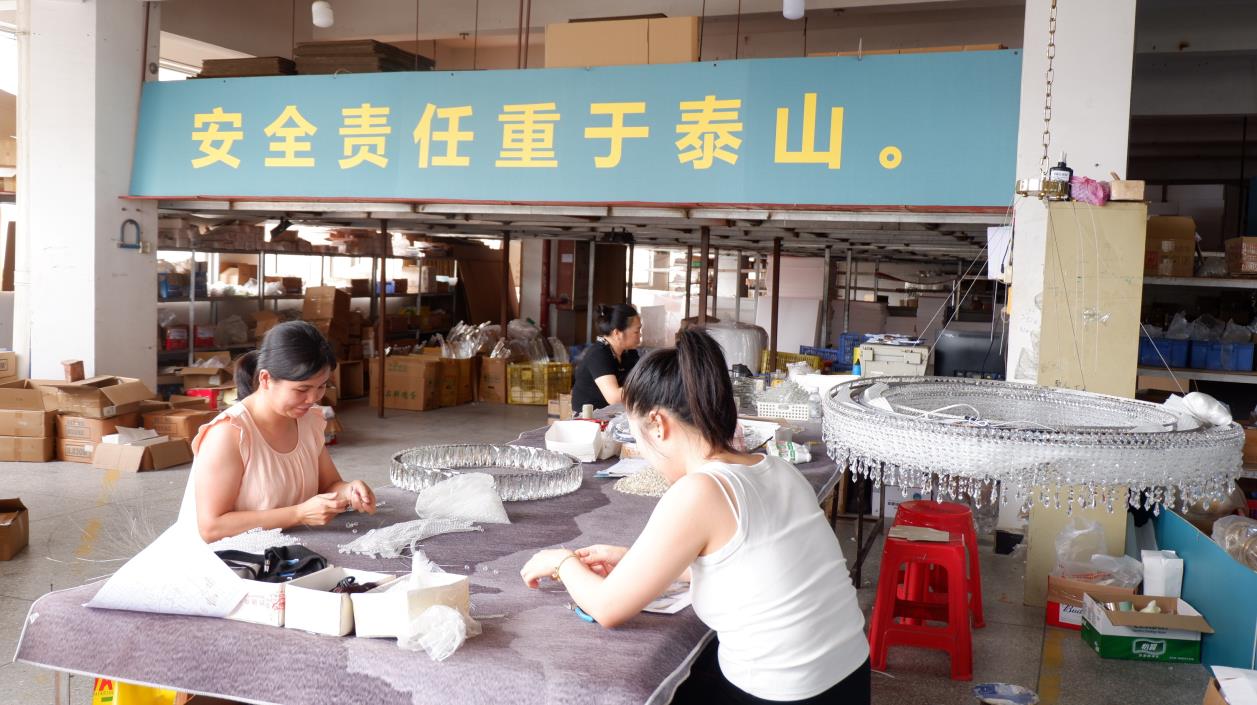 GoodLife Lighting workshop production assembly worker manufacturing fixture build